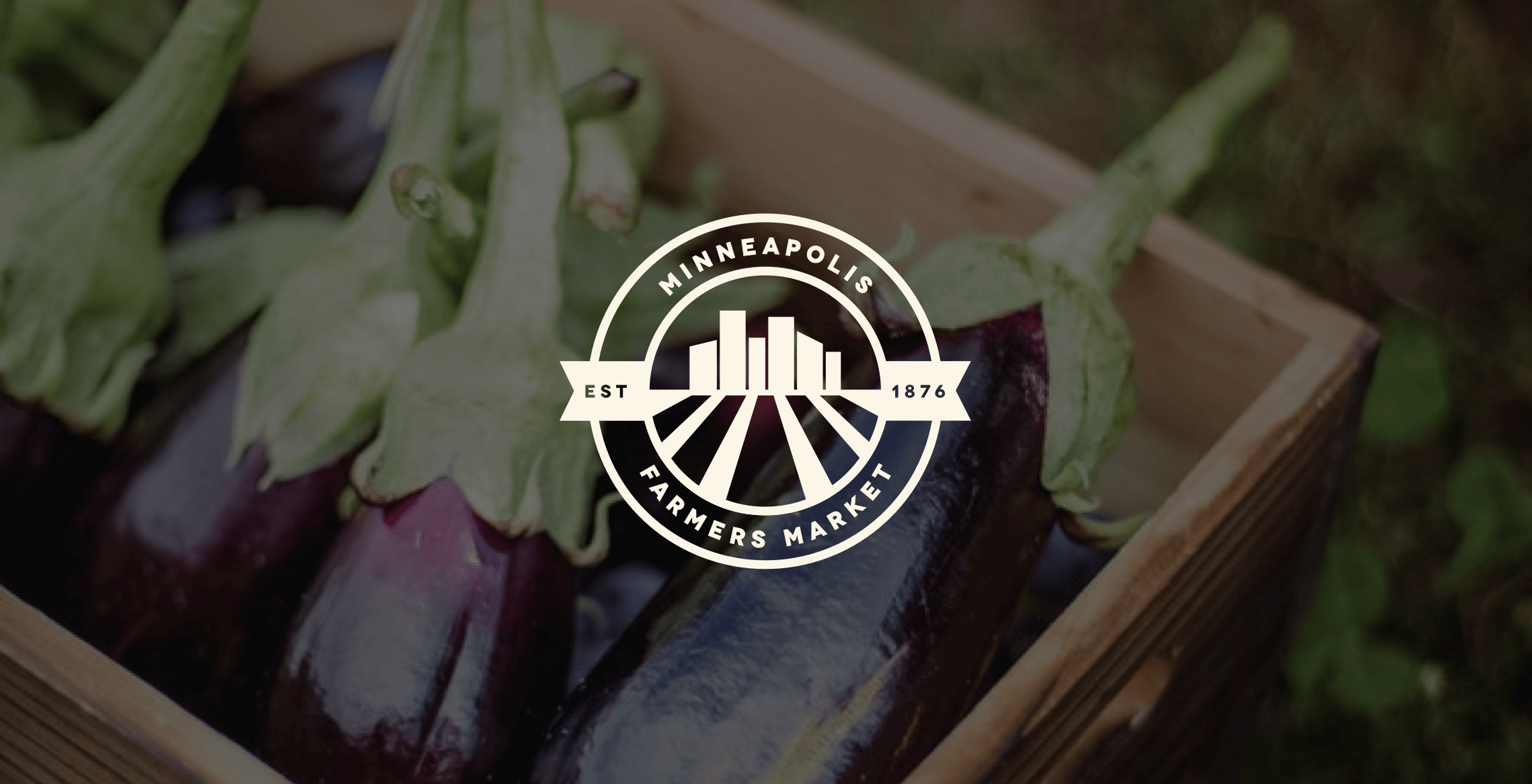 Minneapolis Farmers Market logo over vegetables